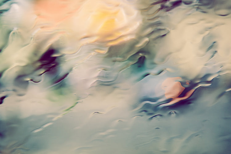 an image of rain coming down on window