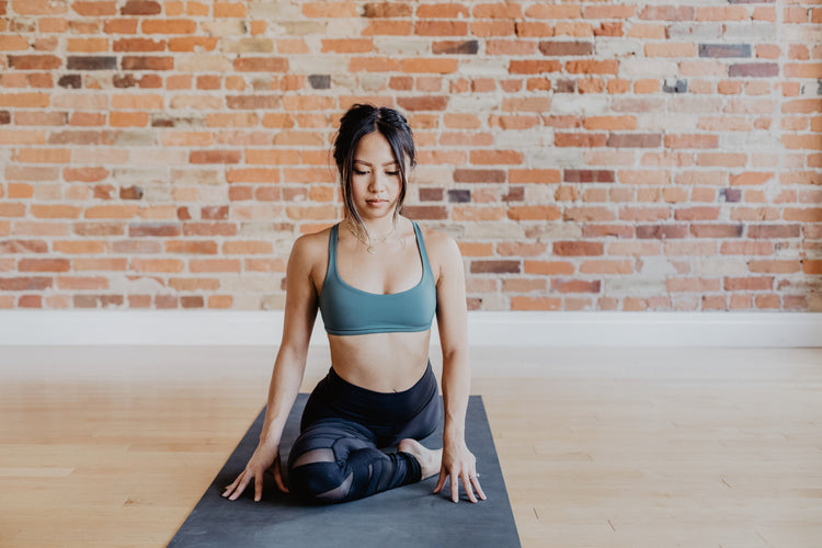 a lady doing yoga poses